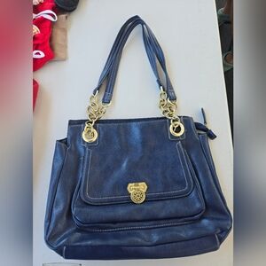 Elegant Blue Handbag with Gold Accents
